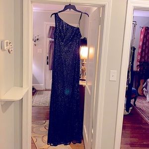 Size 8 midnight blue sequin gown. New with tags